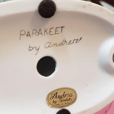 2 parakeet figures