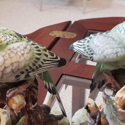 2 parakeet figures