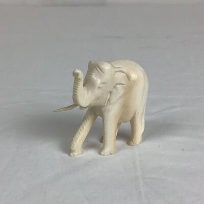 1268 Carved Bone Elephants