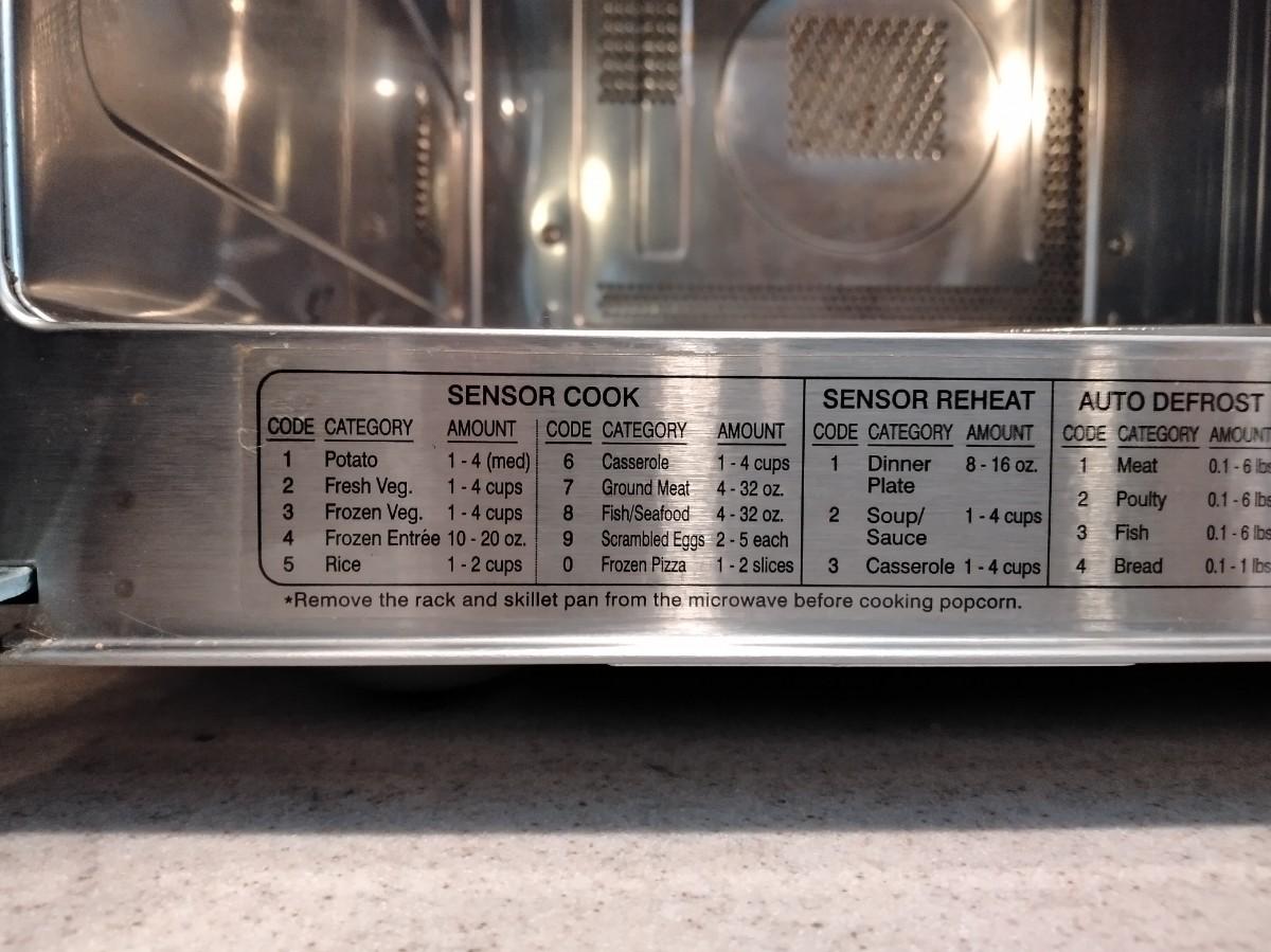 LOT 231 KENMORE MICROWAVE WITH STAINLESS INTERIOR