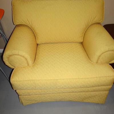 LOT 128. YELLOW UPHOLSTERED CHAIR
