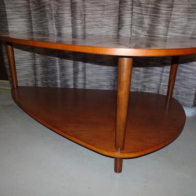 LOT 142. COASTER BRAND COFFEE TABLE