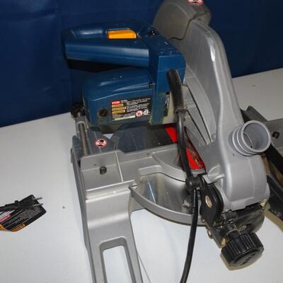 LOT 155. RYOBI COMPOUND MITER SAW