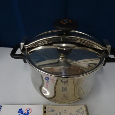 LOT 171. PRESSURE COOKER AND COOK BOOKLS