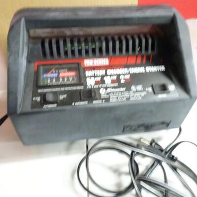 LOT 199        PRO SERIES BATTERY CHARGER AND ENGINE STARTER