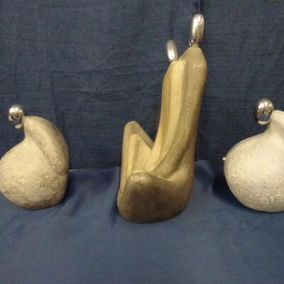 LOT 209. THREE DECORATIVE FIGURINES