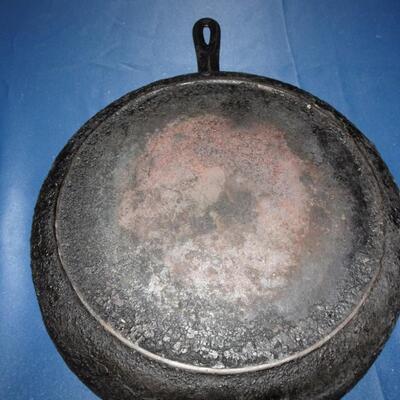 LOT 236. CAST IRON PANS