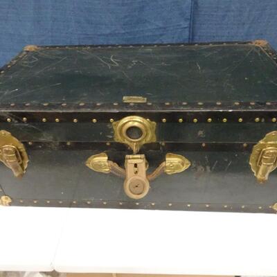 LOT 243. TRUNK WITH CAMPING GEAR
