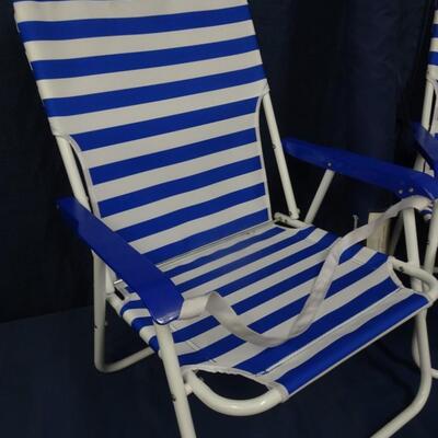 LOT 257. TWO FOLDING CHAIRS AND TOMMY BAHAMA BEACH UMBRELLA
