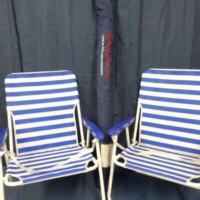LOT 257. TWO FOLDING CHAIRS AND TOMMY BAHAMA BEACH UMBRELLA