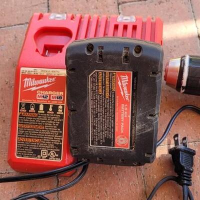 Lot 102: MILWAUKEE M18 Red Lithium Cordless Drill + Charger and Extra Battery