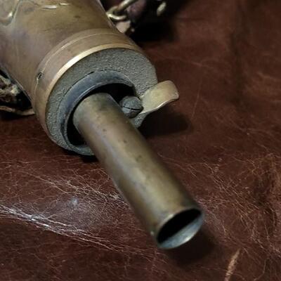 Lot 108: Vintage Reproduction Peace Rifle Gun Powder Flask