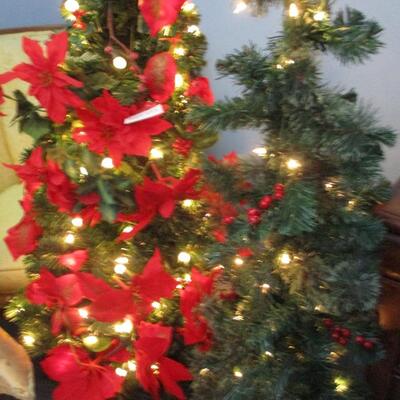 Two 4 ft faux Christmas trees