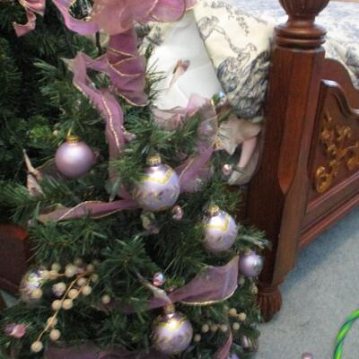 Two faux Christmas trees- lavender decorations