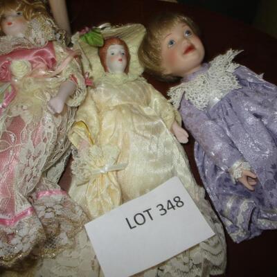 Four Porcelain Dolls