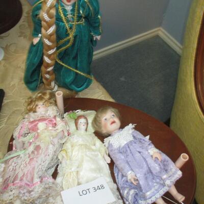 Four Porcelain Dolls