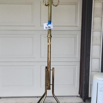 Brass colored coat tree
