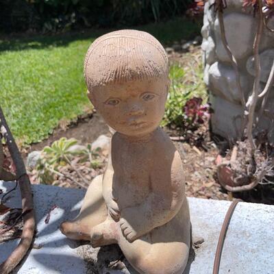 LOT 159  CEMENT STATUE OF A BABY GARDEN YARD ART