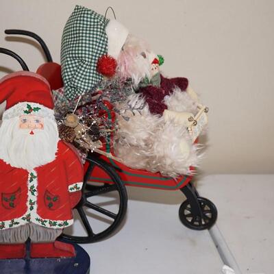 CHRISTMAS GROUPING OF PUPPY IN SLEIGH WITH WOODEN SANTA