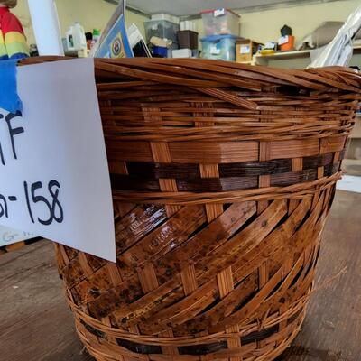 Basket with emergency blankets and umbrella