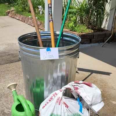Trash can with lid, broom etc