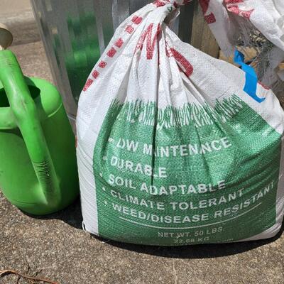 Trash can with lid, broom etc