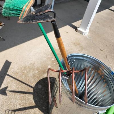 Trash can with lid, broom etc