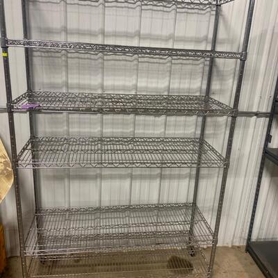 S86 Shelving on wheels, 75 and three-quarter inches tall, 47 1/2 inches wide, 18 inches deep