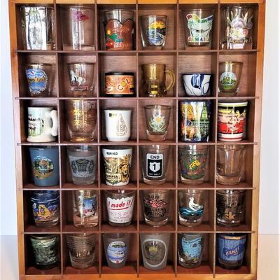 Lot #53  Lot of 36 mixed Shot Glasses in Wooden Rack