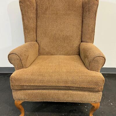 Tan Patterned Wingback Chair