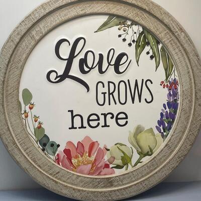 Metal sign- "Love grows here"