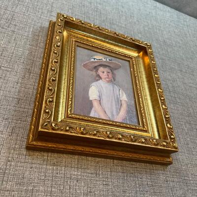 Child in a Straw Hat by Mary Cassatt 