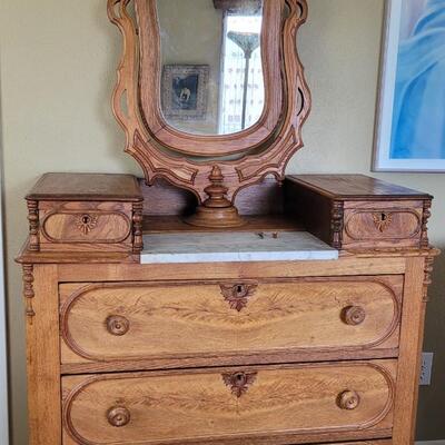 Lot 73: Antique Dresser featuring Marble Top and Original Key