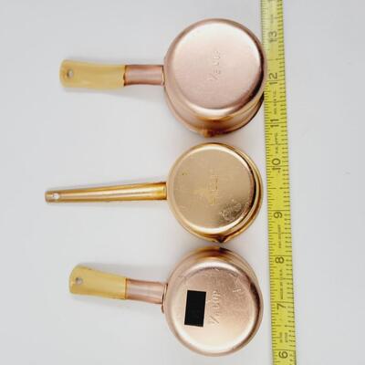 COPPER COLORED MEASURING CUPS