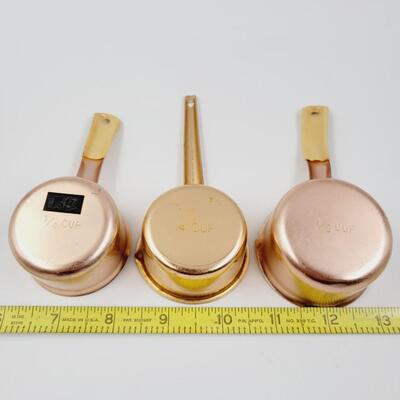 COPPER COLORED MEASURING CUPS