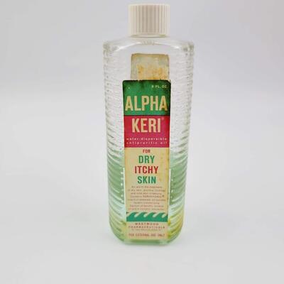 VINTAGE ALPHA KERI GLASS BOTTLE