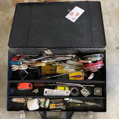 Black tool box with tools