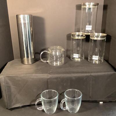 Lot 3038. Bodum Canisters with Stainless Lids  & Clear Glass Pot / Clear Glass Mugs / Stainless Canister