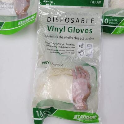 NEW PACKAGES OF VINYL GLOVES