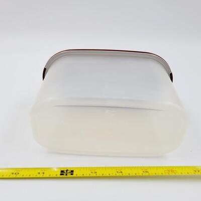 BROWN LIDDED TUPPERWARE CONTAINER