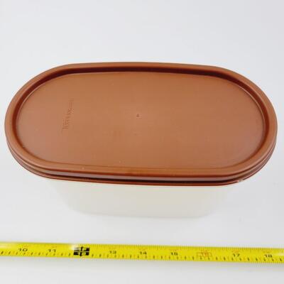 BROWN LIDDED TUPPERWARE CONTAINER