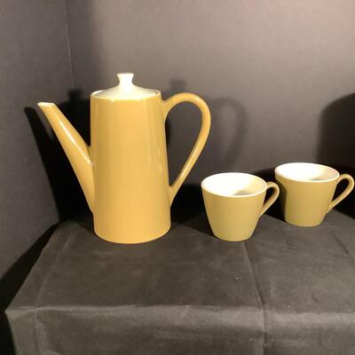 Lot 3042. Three Piece Mid-Century Modern Homer Laughlin Burnt Orange Orbit Ceramic Coffee Set & Ceramic Canister