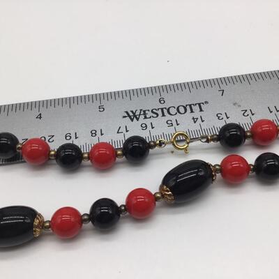 Vintage black Red Beaded Necklace. With Gold Tone Accent