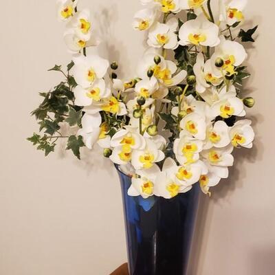 Cobalt blue vase with artificial flowers