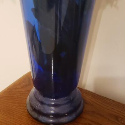 Cobalt blue vase with artificial flowers