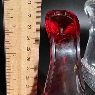 Miniature red and clear pumps
