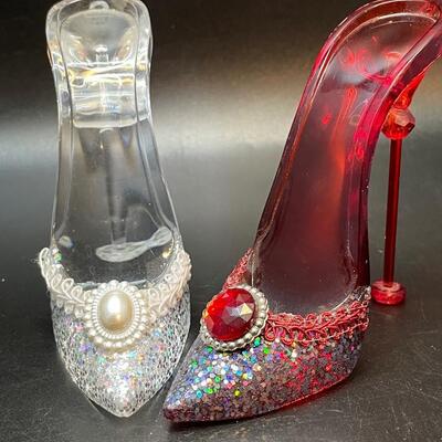 Miniature red and clear pumps