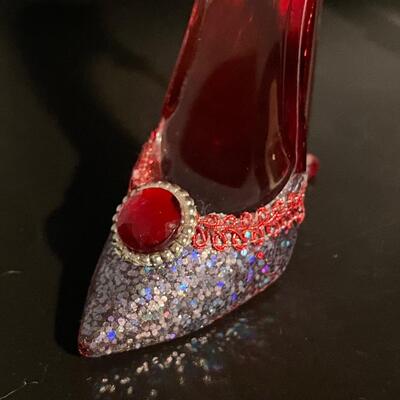 Miniature red and clear pumps