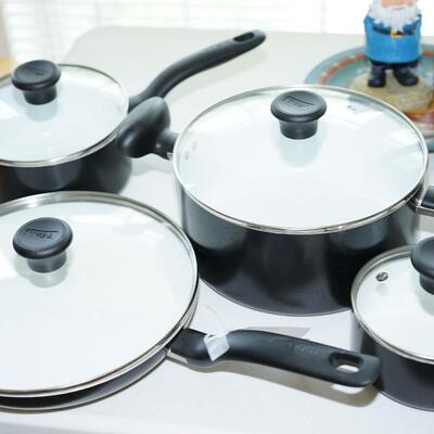 GROUPING OF FOUR T-FAL PANS /NICE CLEAN GENTLY USED