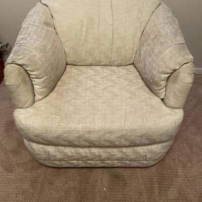 Cream swivel chair